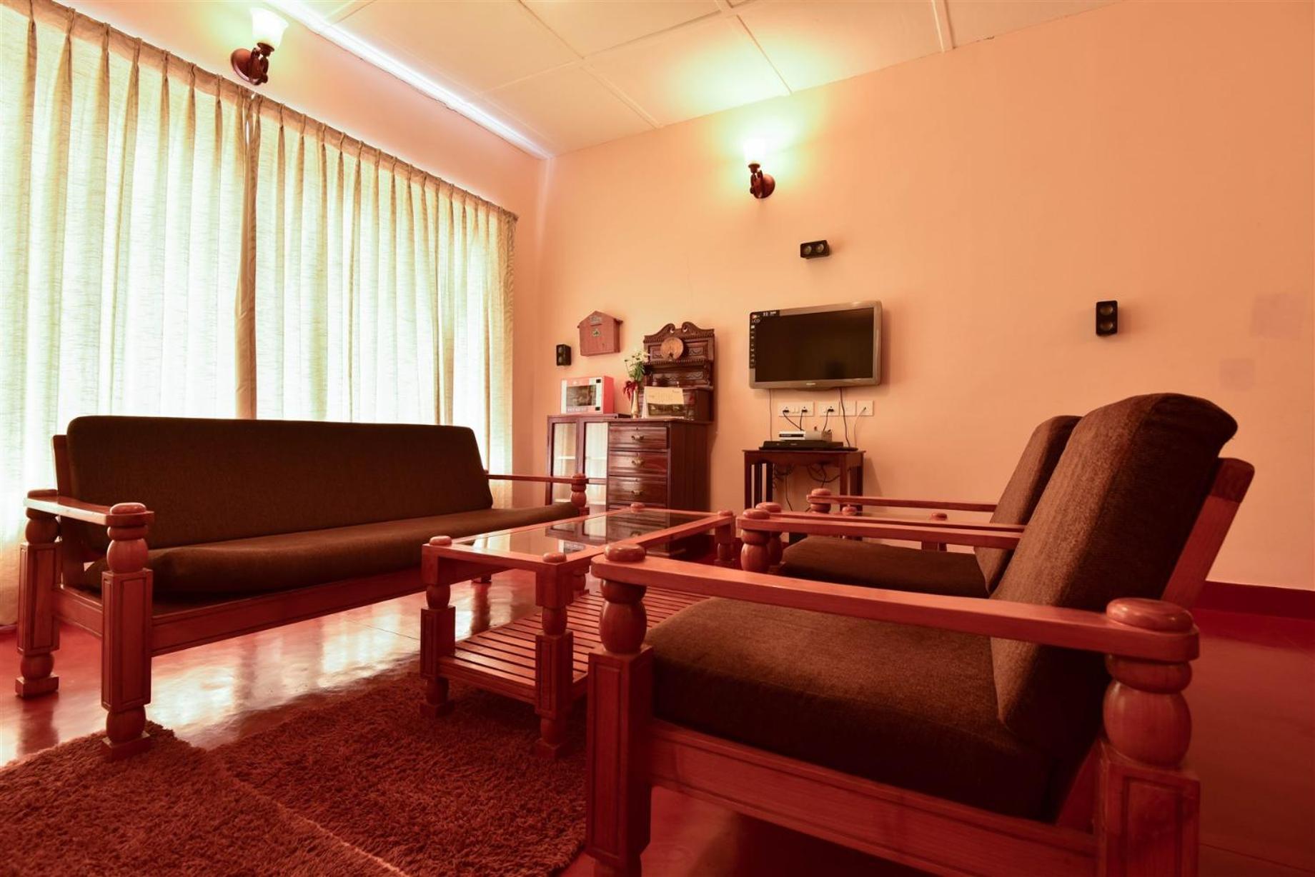فندق Manalar Gudalur  الغرفة الصورة